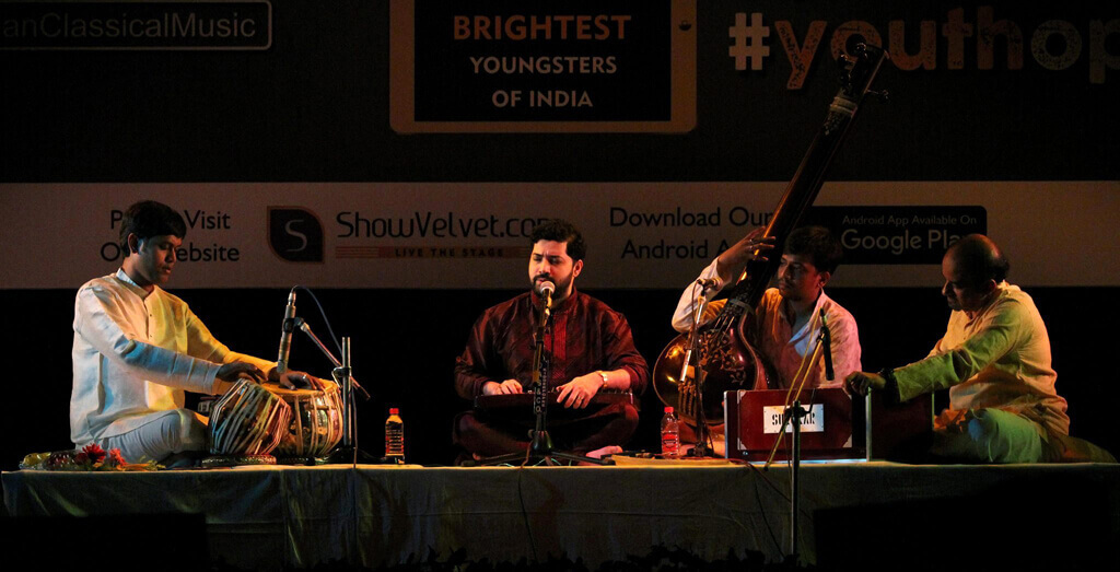 Photo of the Samrat Pandit on stage with 3 musicians at Show Velvet concert