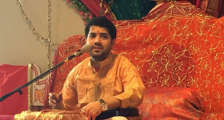 picture of Samrat singing in a temple
